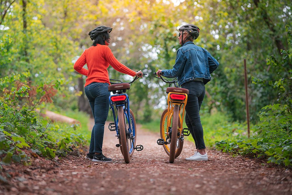 Two women with Pedegos in nature