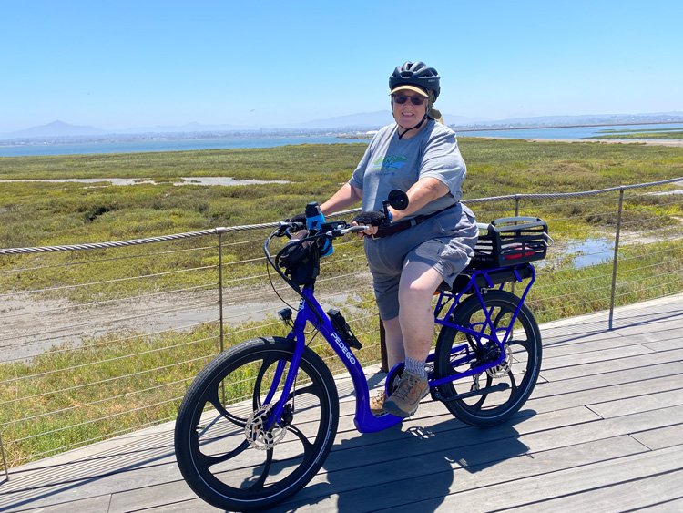 Pedego customer, Lisa Cox, riding her Pedego Boomerang.