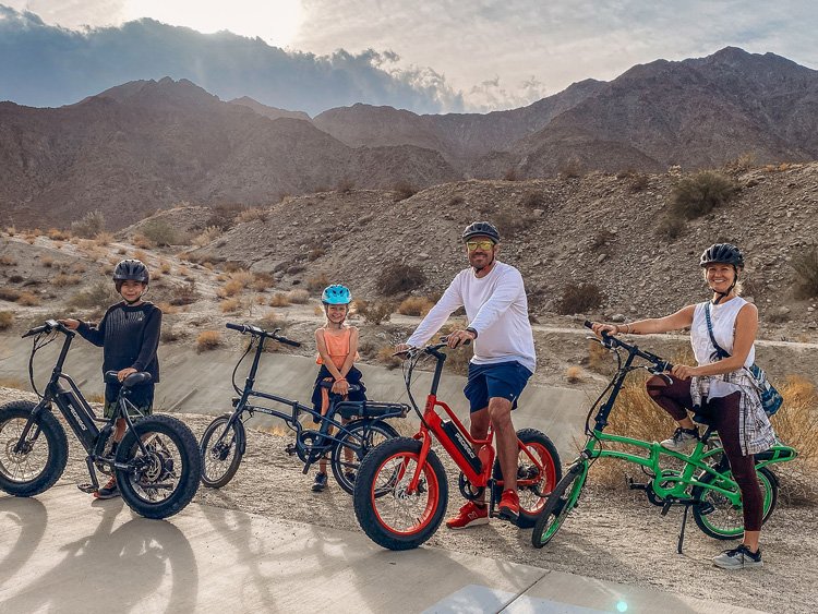 Wanderprenuers riding their bikes in the desert.