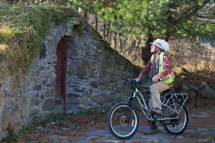 David Hayles looking at ruins on his Pedego Platinum Edition